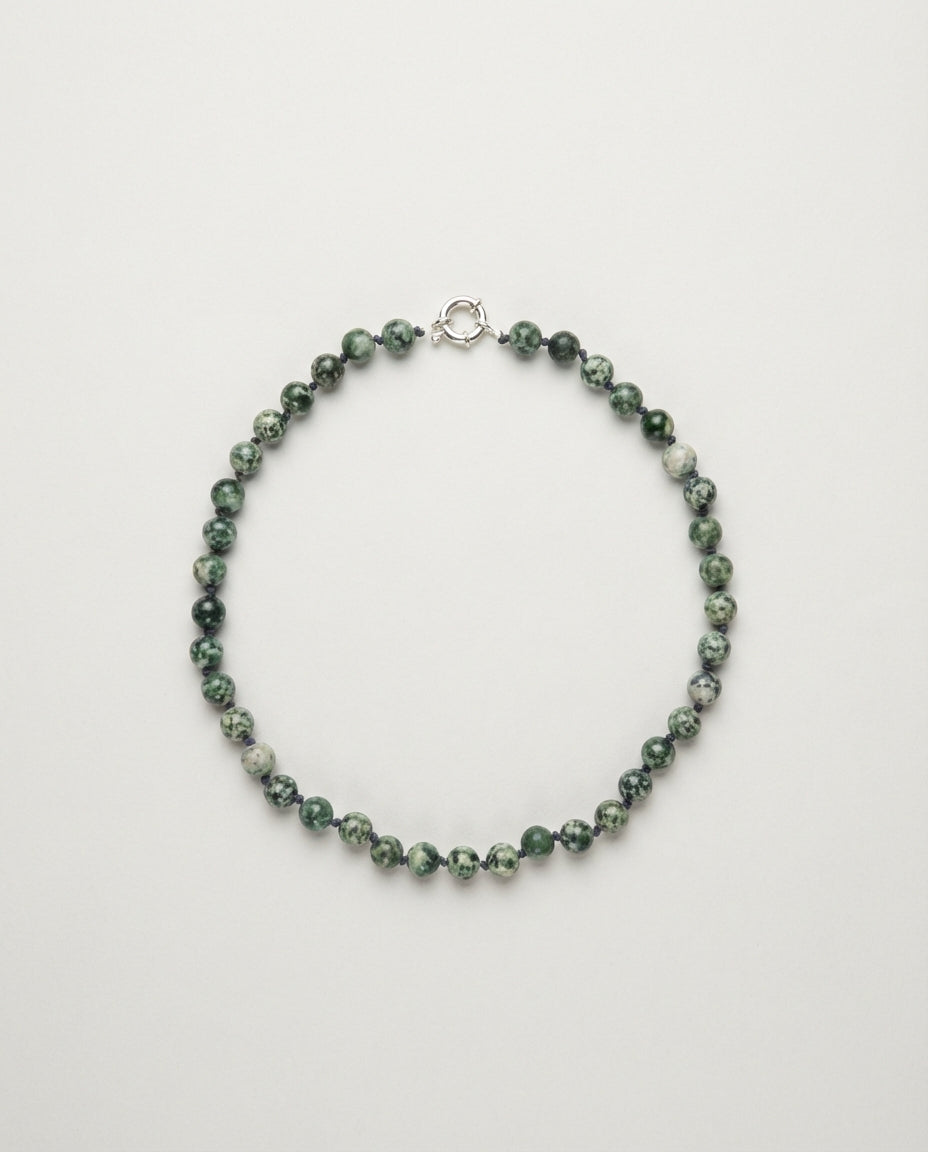 State IV — Green dot stone