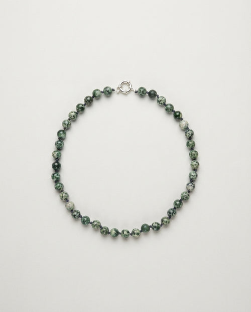 State IV — Green dot stone