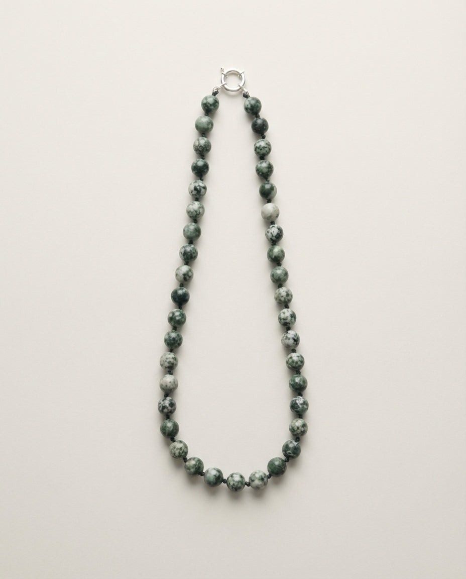 State IV — Green dot stone