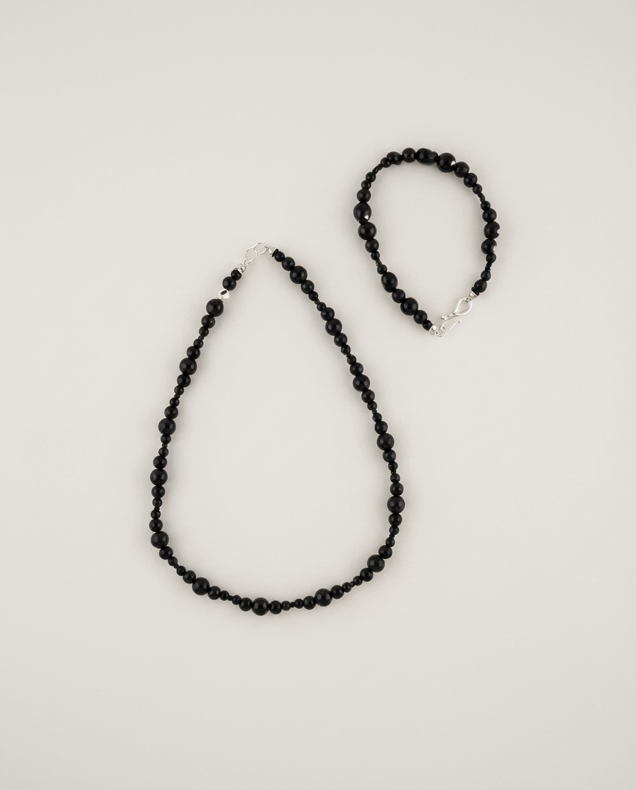 State VI — Black quartz