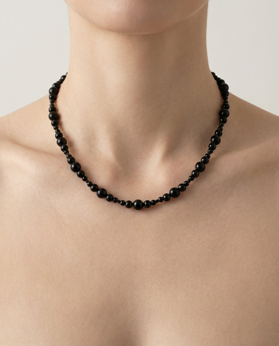 State VI — Black quartz